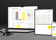 A laptop, tablet and mobile phone displaying various screens from the productivity analyser. 