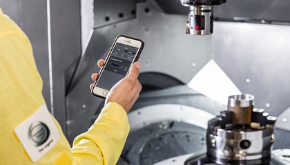 Hand holding smartphone.