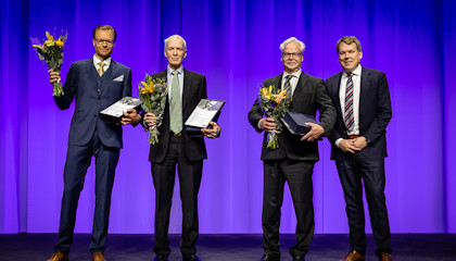 The three award winners on stage together with President and CEO Stefan Widing.