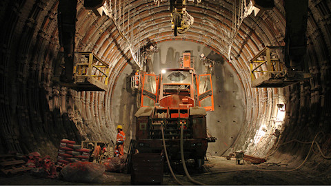 Axera T12-Sedrun drilling jumbo in action in the tunnel
