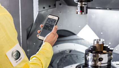 Hand holding smartphone.