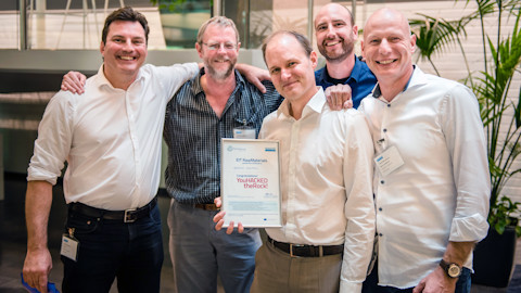Five persons recieving the winner diploma.